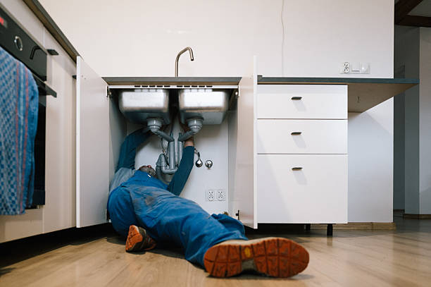 Professional Emergency Plumber technician working in Forest Hill, MD